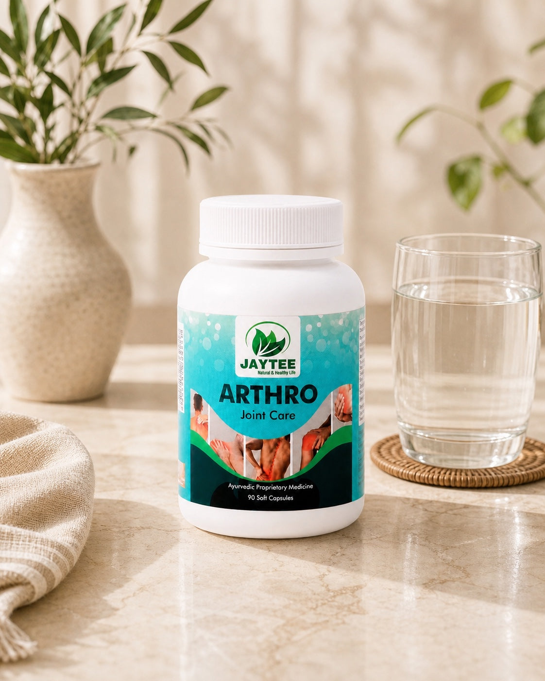 Closed Arthro Joint Care 90-soft-capsule bottle beside a glass of warm water in morning light