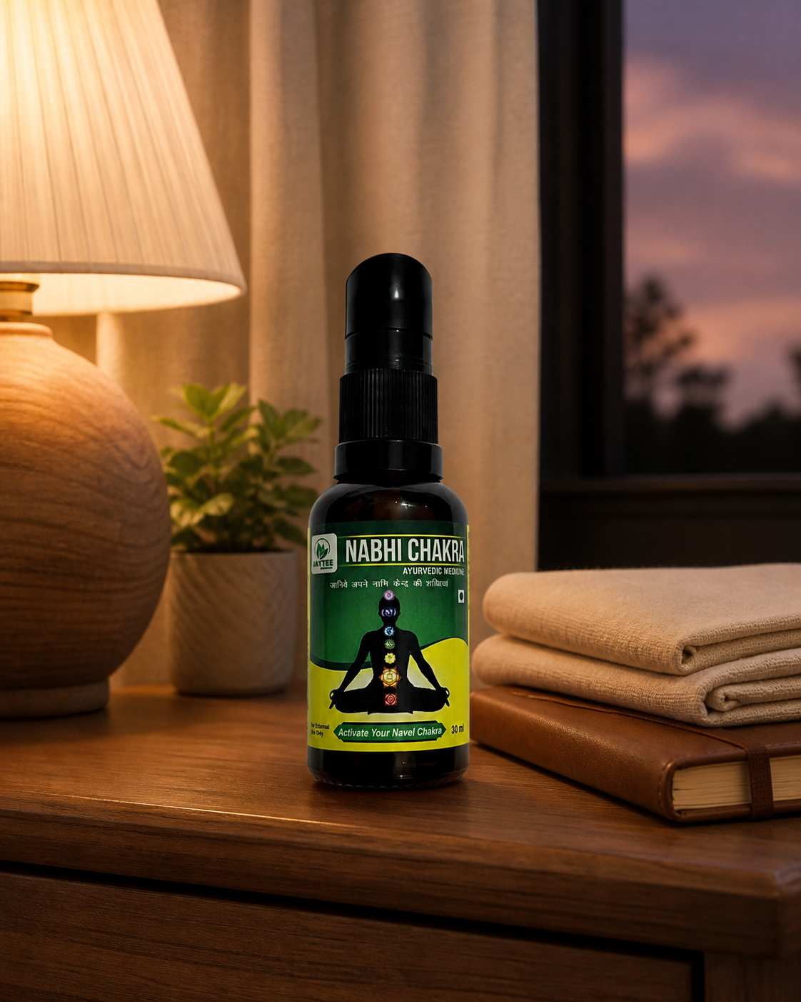 Closed Nabhi Chakra 30 ml bottle in a calm bedside care setting