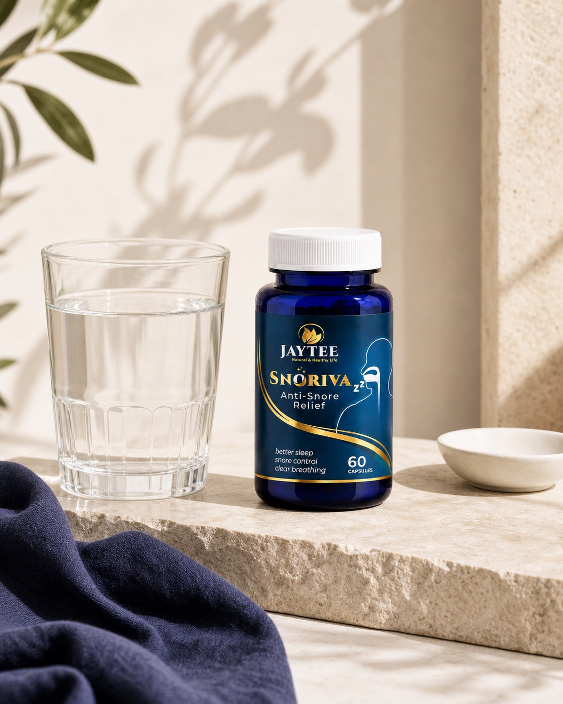 Closed SNORIVA 60-capsule bottle beside a glass of water in a neutral daily routine